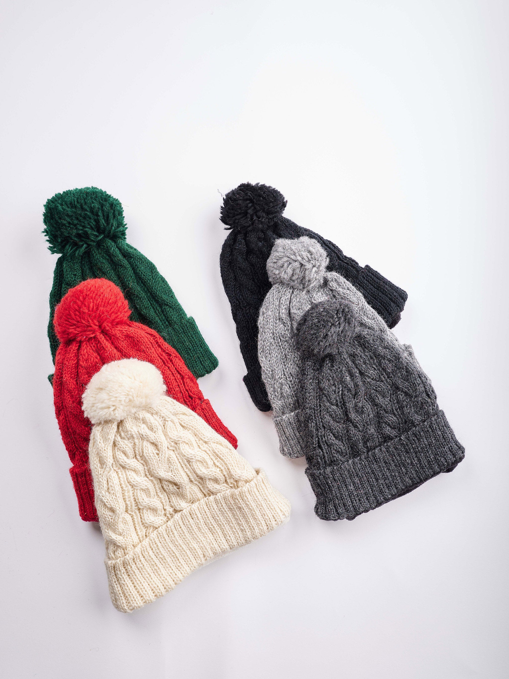 Cable Knit Pom Pom Beanie.
