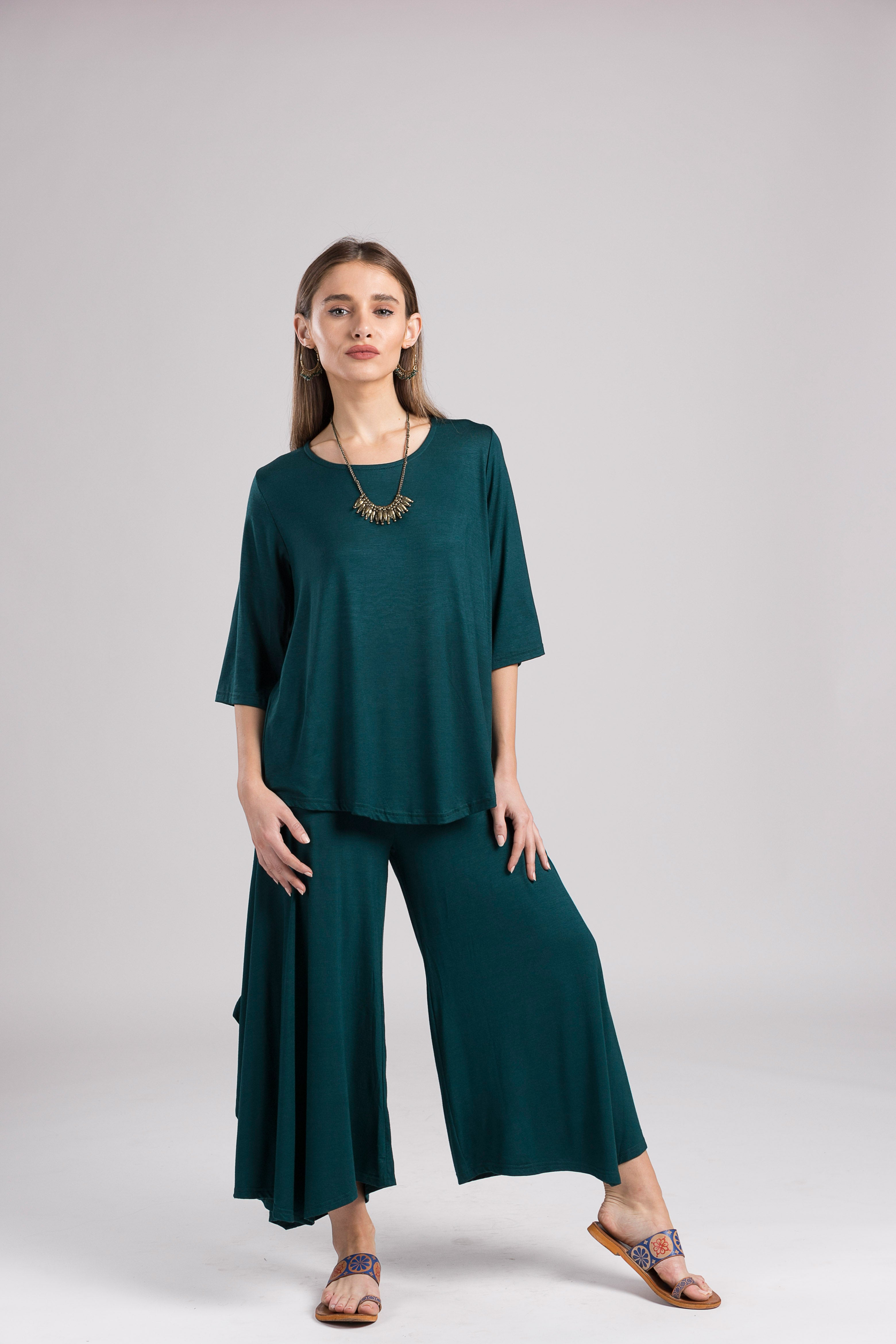 What Are Trousers With a Skirt Attached Called? Skirt Pants, Hostess Gowns  & Salwar Kameez Explained – Chicy C… | Cape jumpsuit, Dresses with sleeves,  Skirt fashion